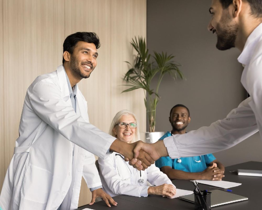 employee meeting with doctor