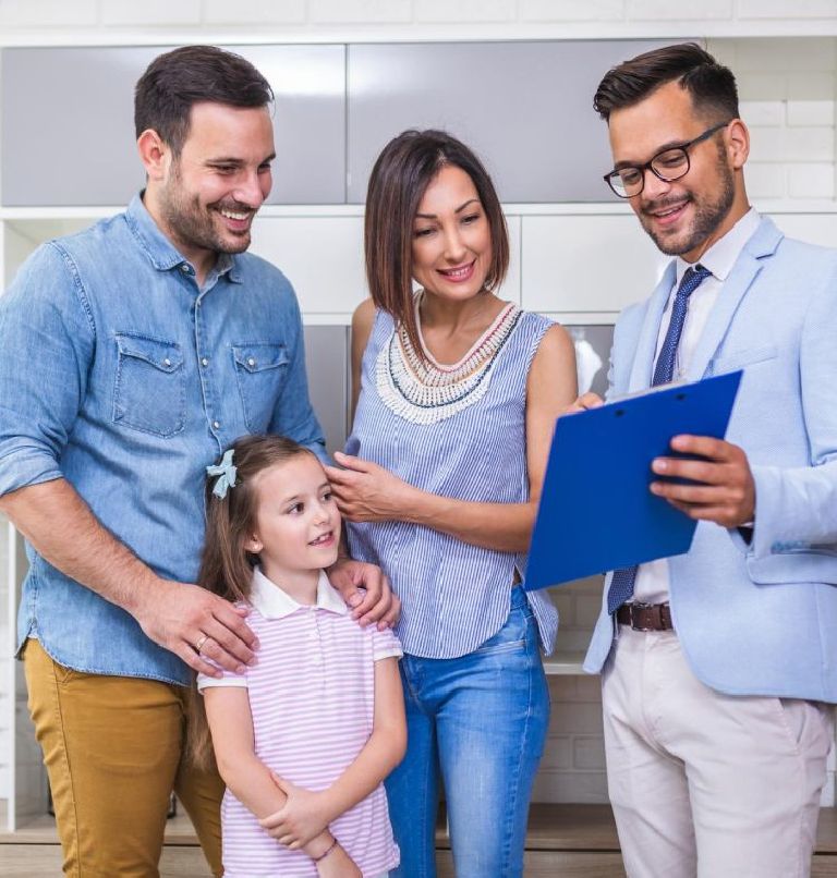 family with insurance agent(