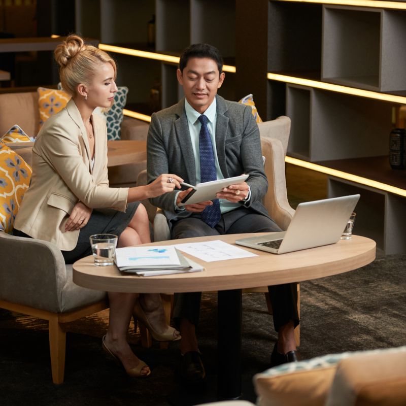 two buisness partner sitting together